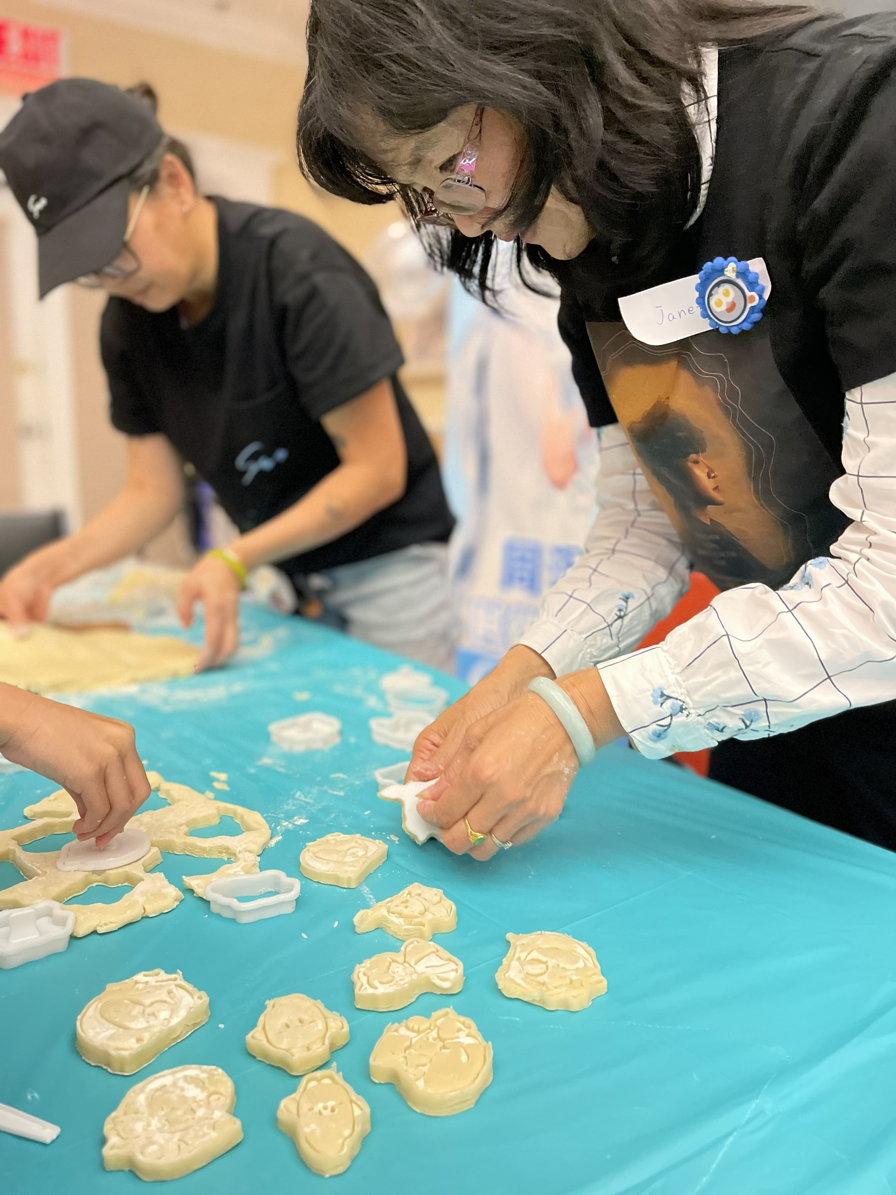 People gathered for a baking workshop.