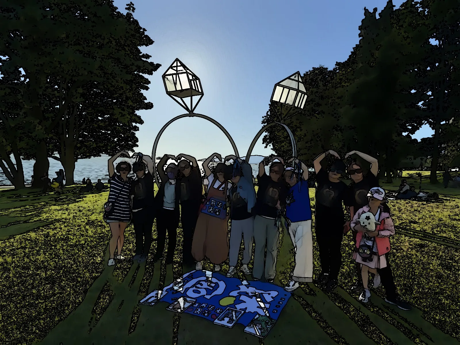 A cartoonized group photo outdoors standing on grass beneath public art.